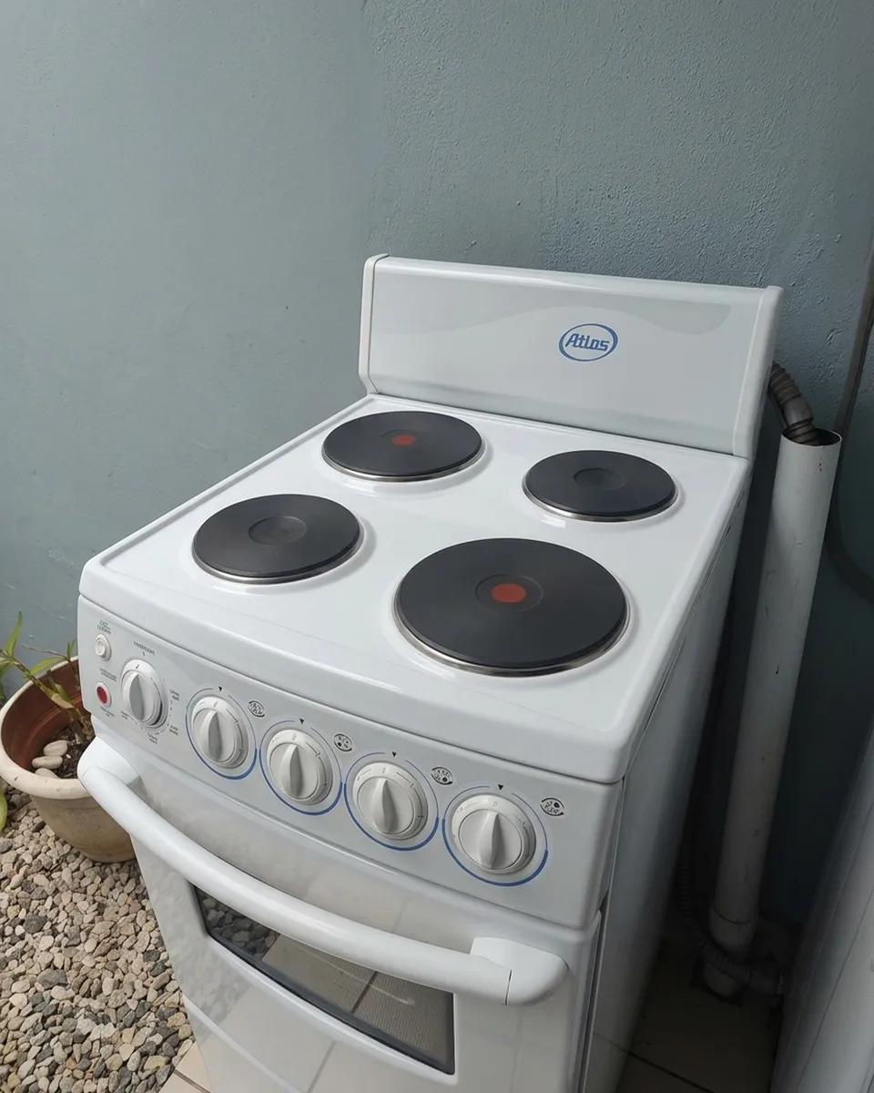 Cocina eléctrica reparada después del cambio de dos discos